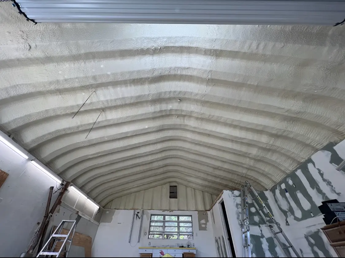 Spray polyurethane foam applied to the underside of a metal roof deck in Hawaiian Paradise Park